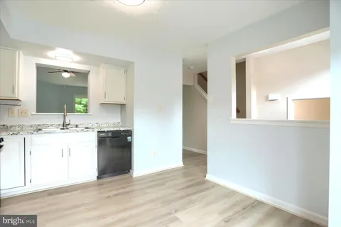 a view of a kitchen with a sink