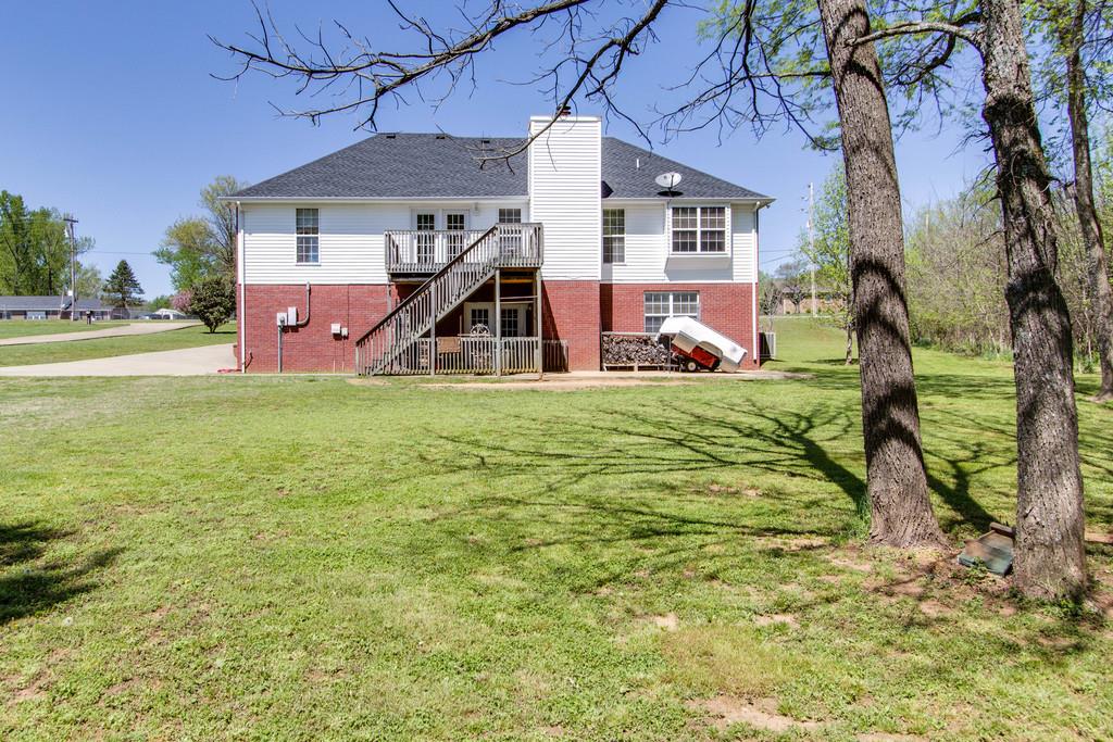 675 Baker Road Columbia, TN 38401 - Photo 22 of 24 a view of a house with a yard