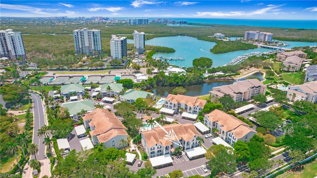 470 Bermuda Cove Way, Unit 2104 Naples, FL 34110 - Photo 32 of 35 View of property location with a nearby body of water, nearby urban area, and nearby suburban area