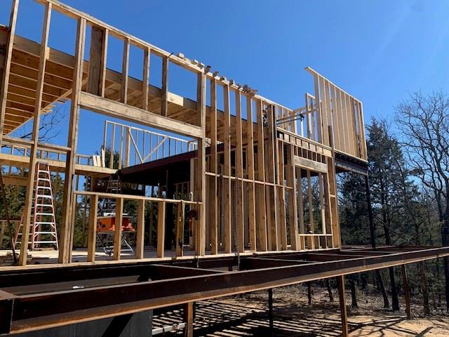 924 The Oil Road Gainesville, TX 76240 - Photo 29 of 39 Erecting Walls and Roof