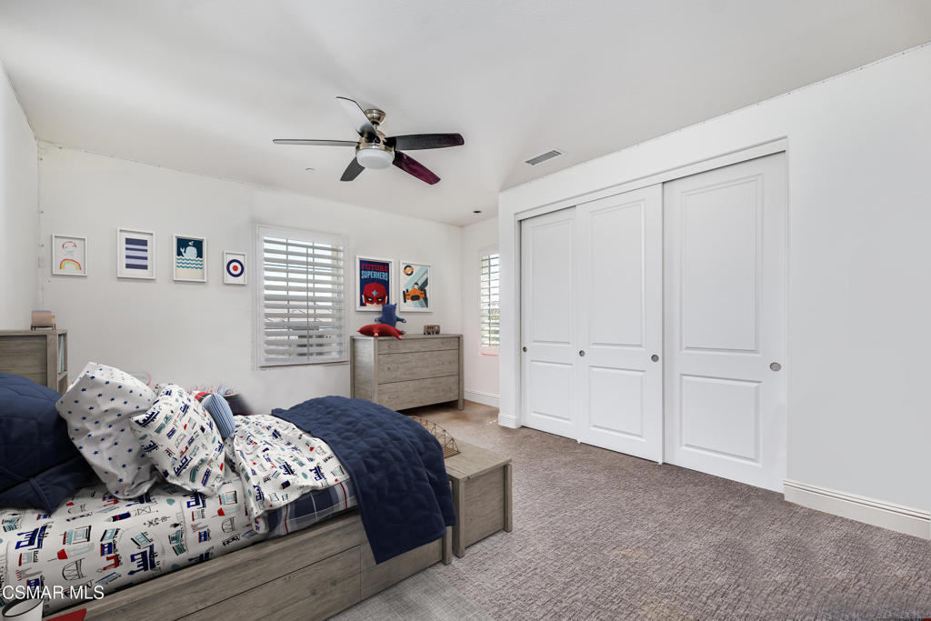 7377 Woods Court Moorpark, CA 93021 - Photo 16 of 29 a bedroom with a bed and a window