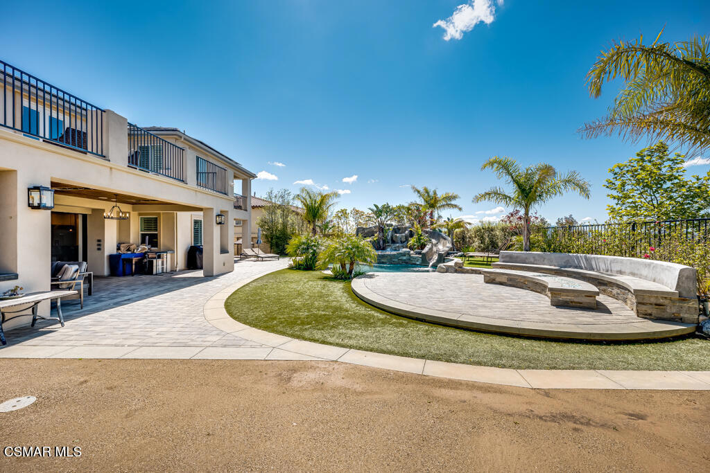 7377 Woods Court Moorpark, CA 93021 - Photo 25 of 29 a building with trees in front of it