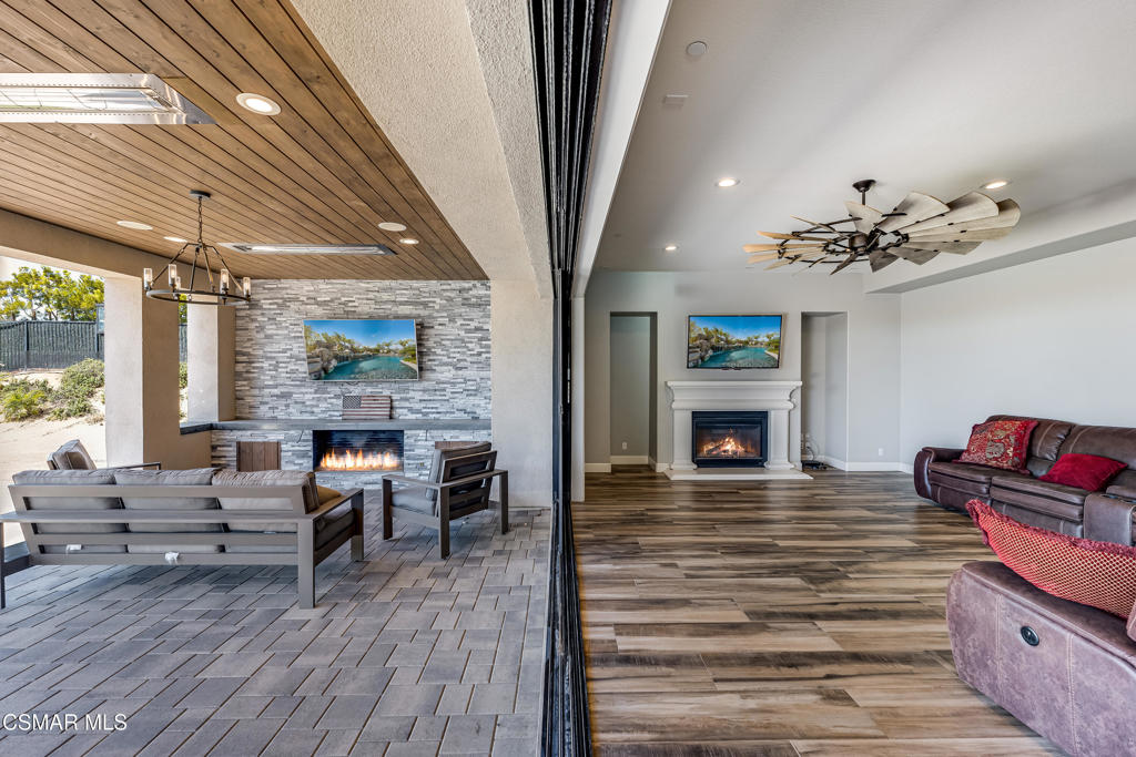 7377 Woods Court Moorpark, CA 93021 - Photo 3 of 29 a living room with furniture and a fireplace