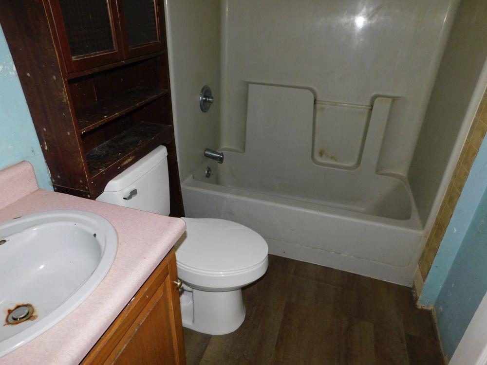 345 Old Ash Road Mercer, PA 16137 - Photo 8 of 10 a bathroom with a sink toilet and shower