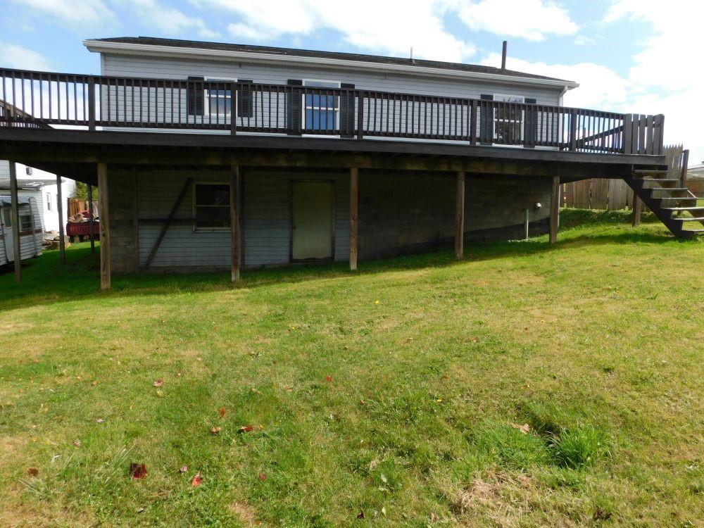 345 Old Ash Road Mercer, PA 16137 - Photo 10 of 10 a view of a house with a backyard