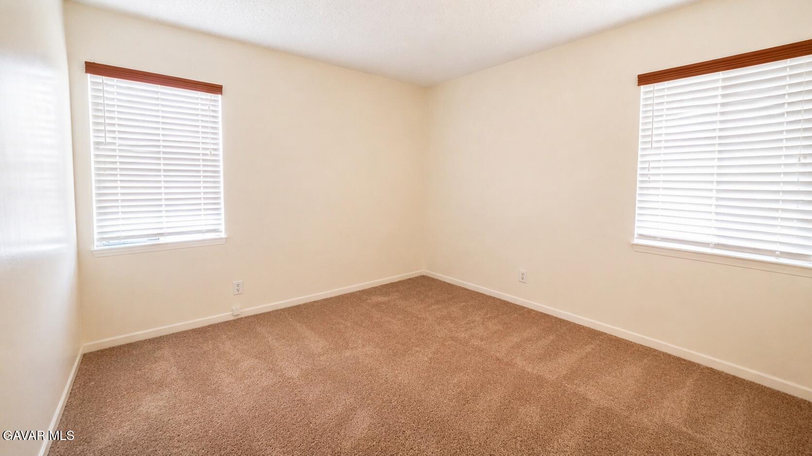 45409 Rodin Avenue Lancaster, CA 93535 - Photo 11 of 17 an empty room with a window