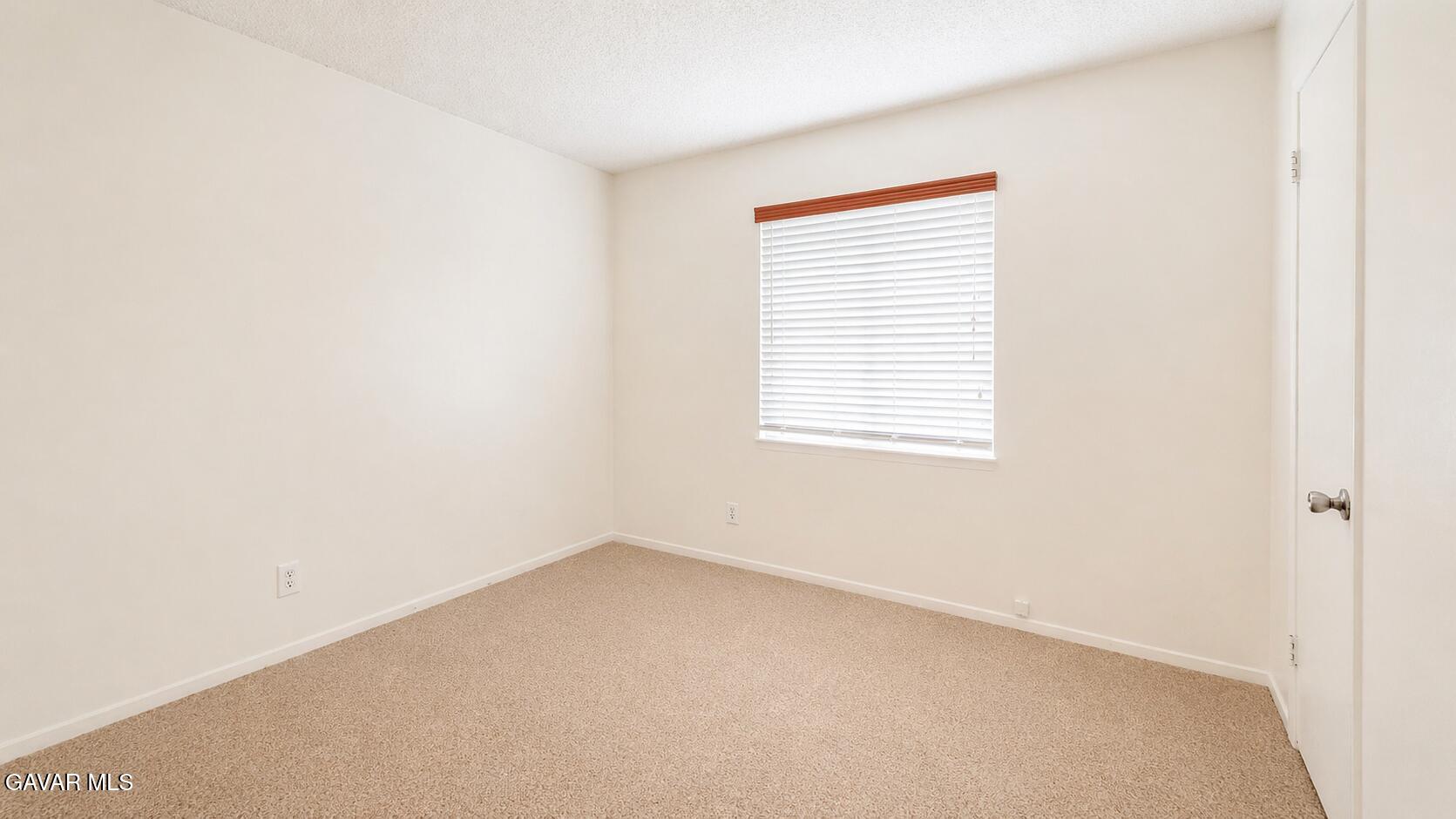 45409 Rodin Avenue Lancaster, CA 93535 - Photo 16 of 17 an empty room with a window