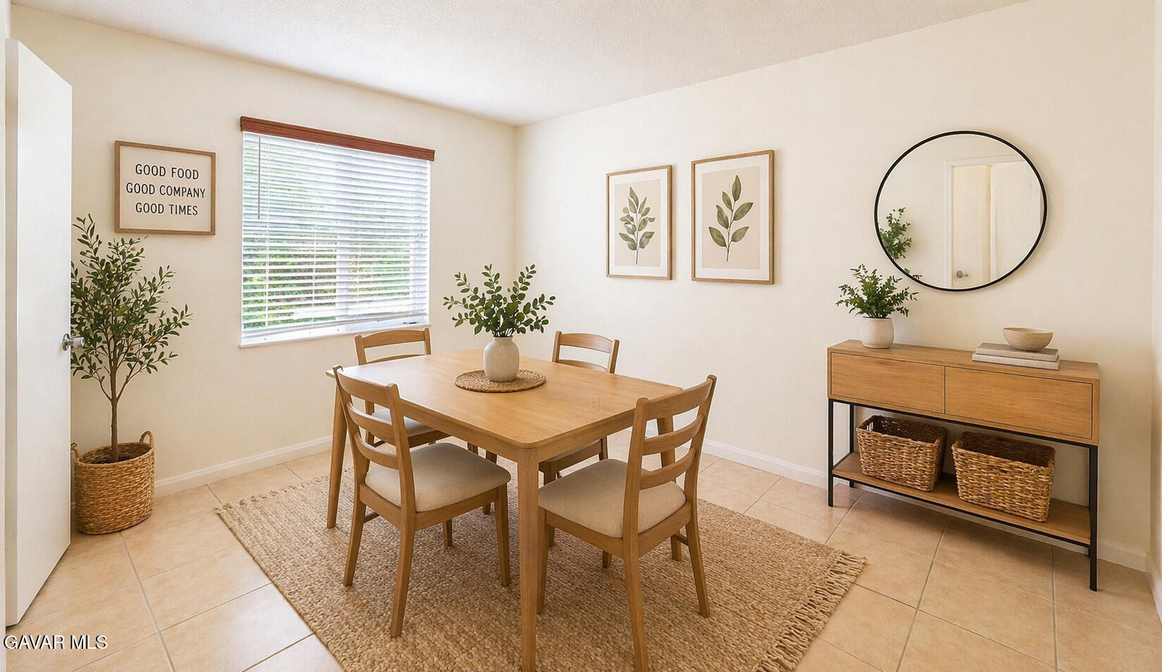 45409 Rodin Avenue Lancaster, CA 93535 - Photo 5 of 17 a view of a dining room with furniture and a potted plant