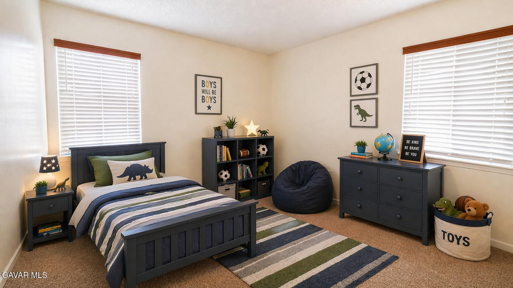45409 Rodin Avenue Lancaster, CA 93535 - Photo 10 of 17 a bedroom with a bed and a window