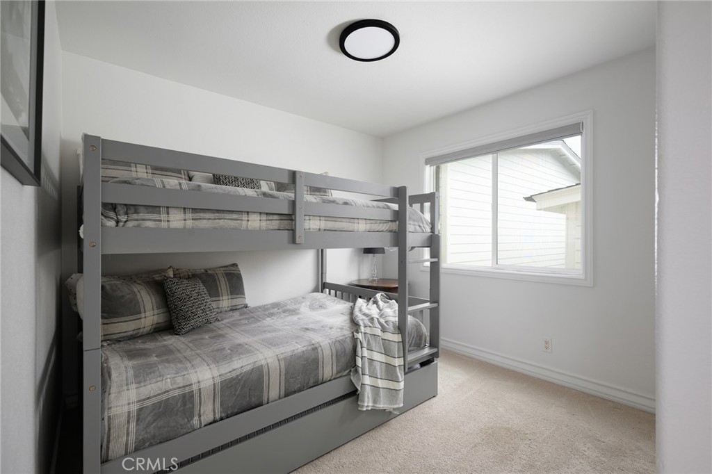 618 Iris Avenue, Unit B Corona del Mar, CA 92625 - Photo 13 of 20 a bedroom with a bed and window