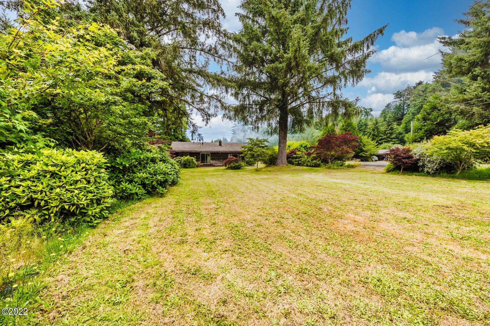 2420 North North Bank Road Otis, OR 97368 - Photo 25 of 30 2420 Backyard looking West