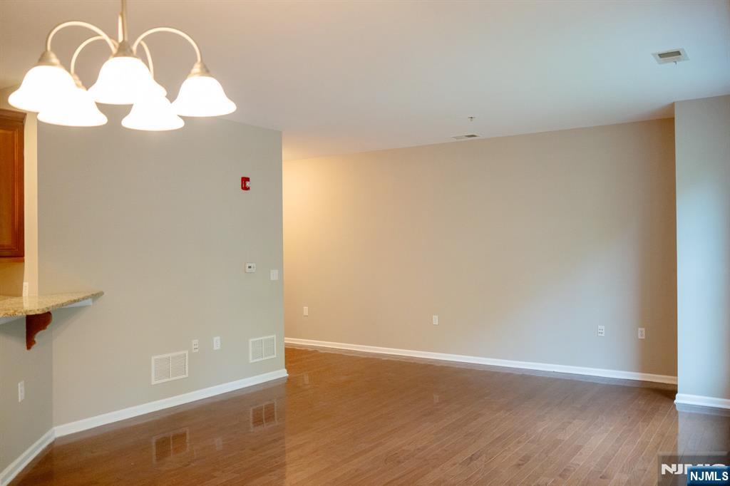 804 River Place Butler, NJ 07405 - Photo 12 of 32 a view of a livingroom with wooden floor