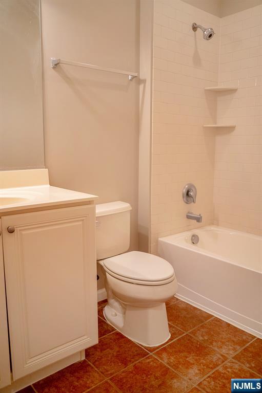 804 River Place Butler, NJ 07405 - Photo 25 of 32 a bathroom with a toilet and a bath tub