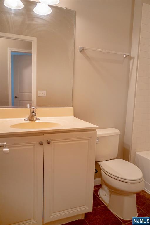 804 River Place Butler, NJ 07405 - Photo 26 of 32 a bathroom with a sink a toilet and shower