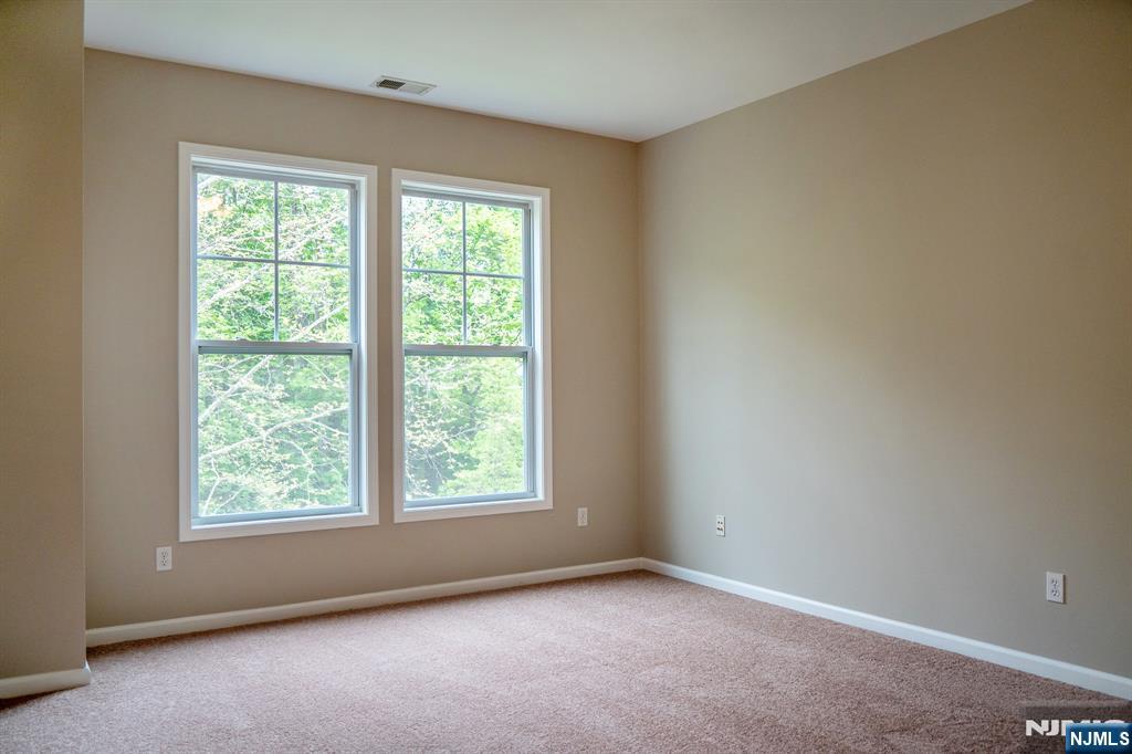 804 River Place Butler, NJ 07405 - Photo 29 of 32 an empty room with a window