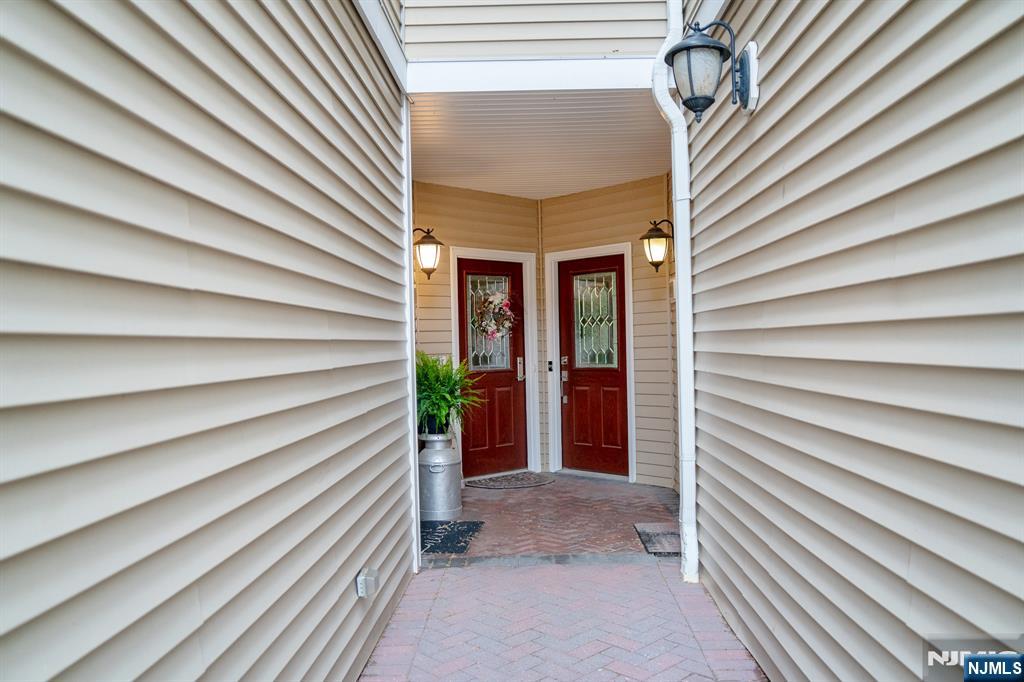 804 River Place Butler, NJ 07405 - Photo 3 of 32 a view of entryway front of house