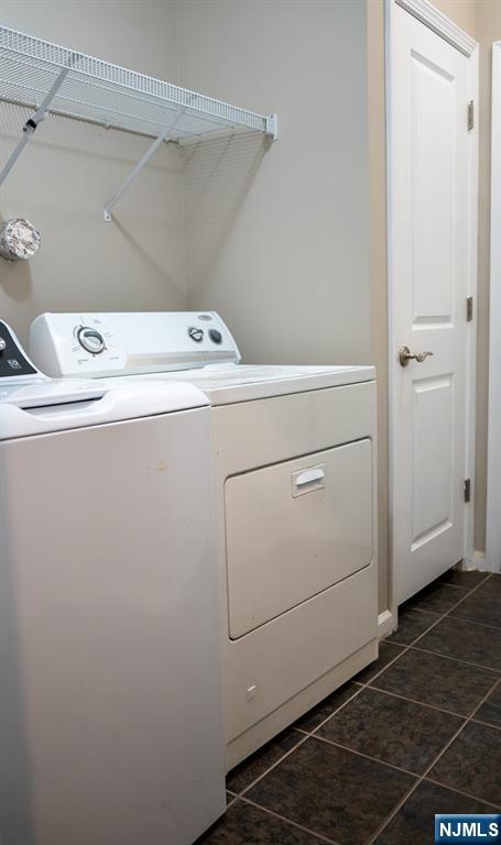 804 River Place Butler, NJ 07405 - Photo 6 of 32 a utility room with dryer and washer