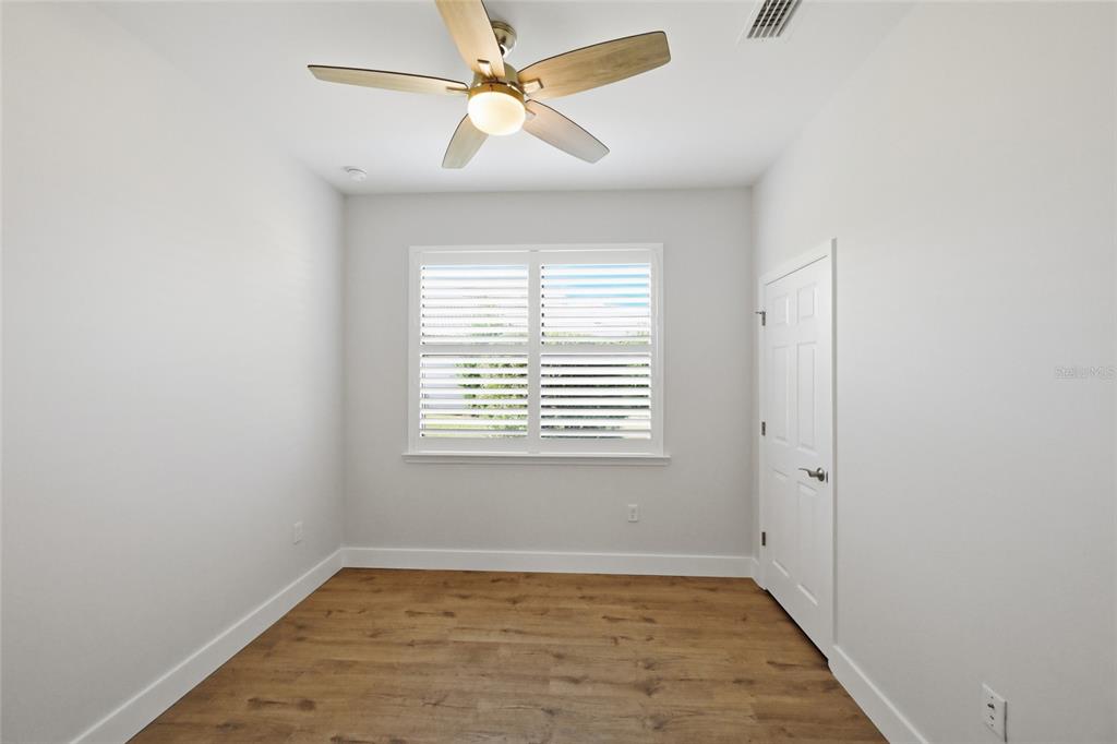 17029 Hampton Falls Terrace Lakewood Ranch, FL 34202 - Photo 29 of 56 a view of an empty room with a window