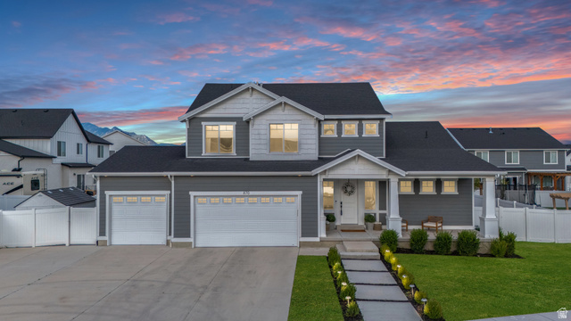 870 North Ada Loop Lehi, UT 84048 - Photo 1 of 51 Modern two-story residence featuring a dark gray and light gray facade with white trim