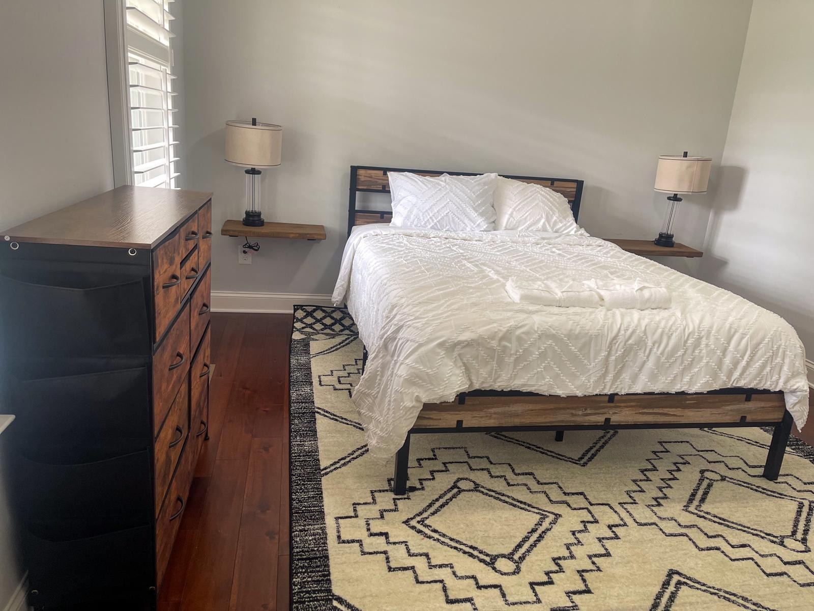 7152 Triple Crown Lane Fairview, TN 37062 - Photo 5 of 10 a bedroom with a bed and wooden floor