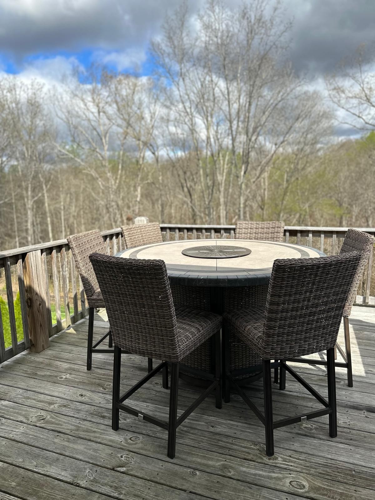 7152 Triple Crown Lane Fairview, TN 37062 - Photo 9 of 10 a patio with wooden floor a yard a table and chairs