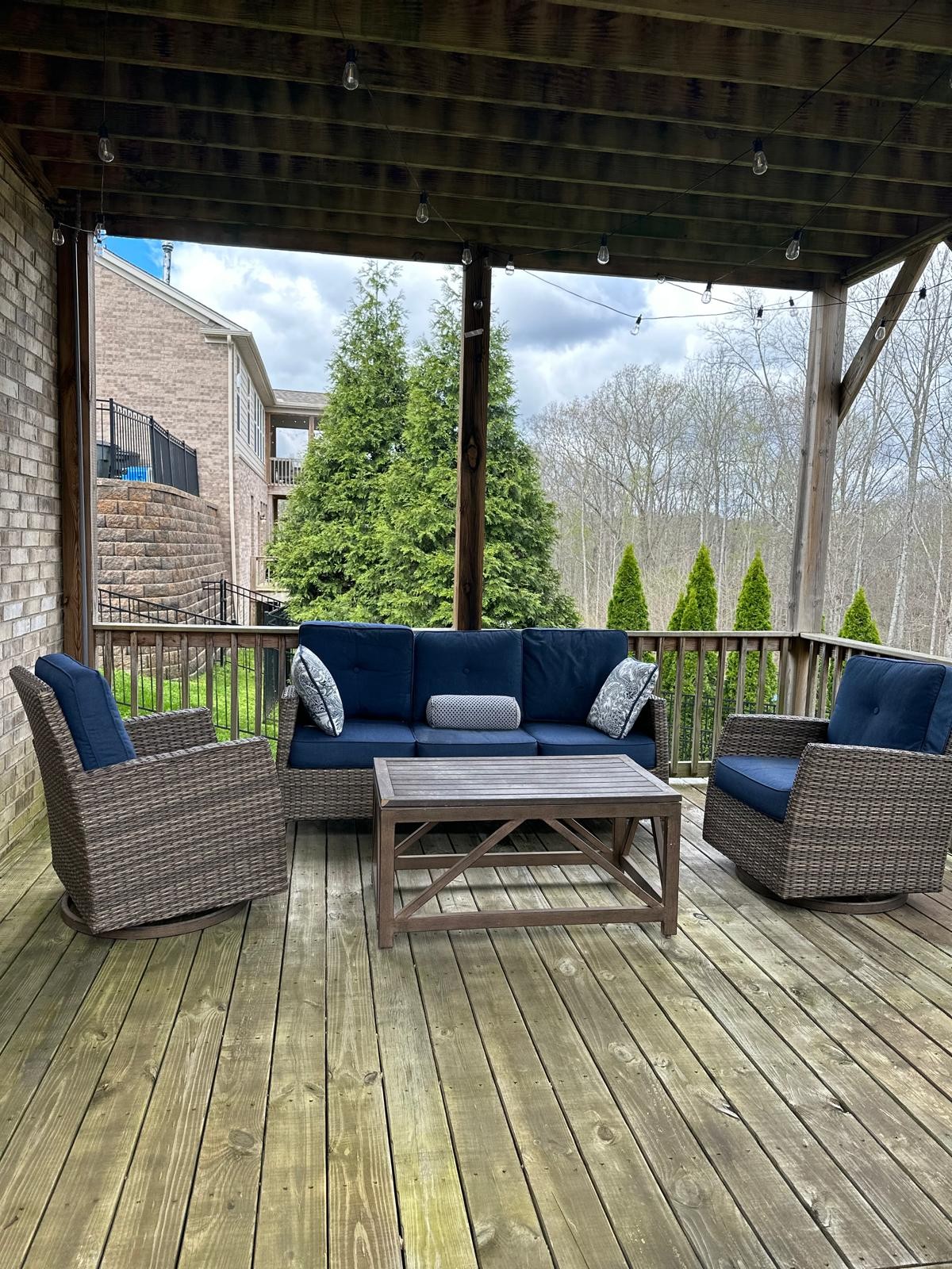 7152 Triple Crown Lane Fairview, TN 37062 - Photo 10 of 10 a balcony with wooden floor and outdoor seating