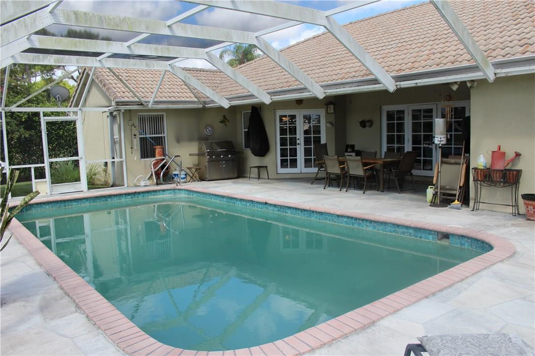 1335 Sabal Lakes Road Delray Beach, FL 33445 - Photo 13 of 16 Pool patio