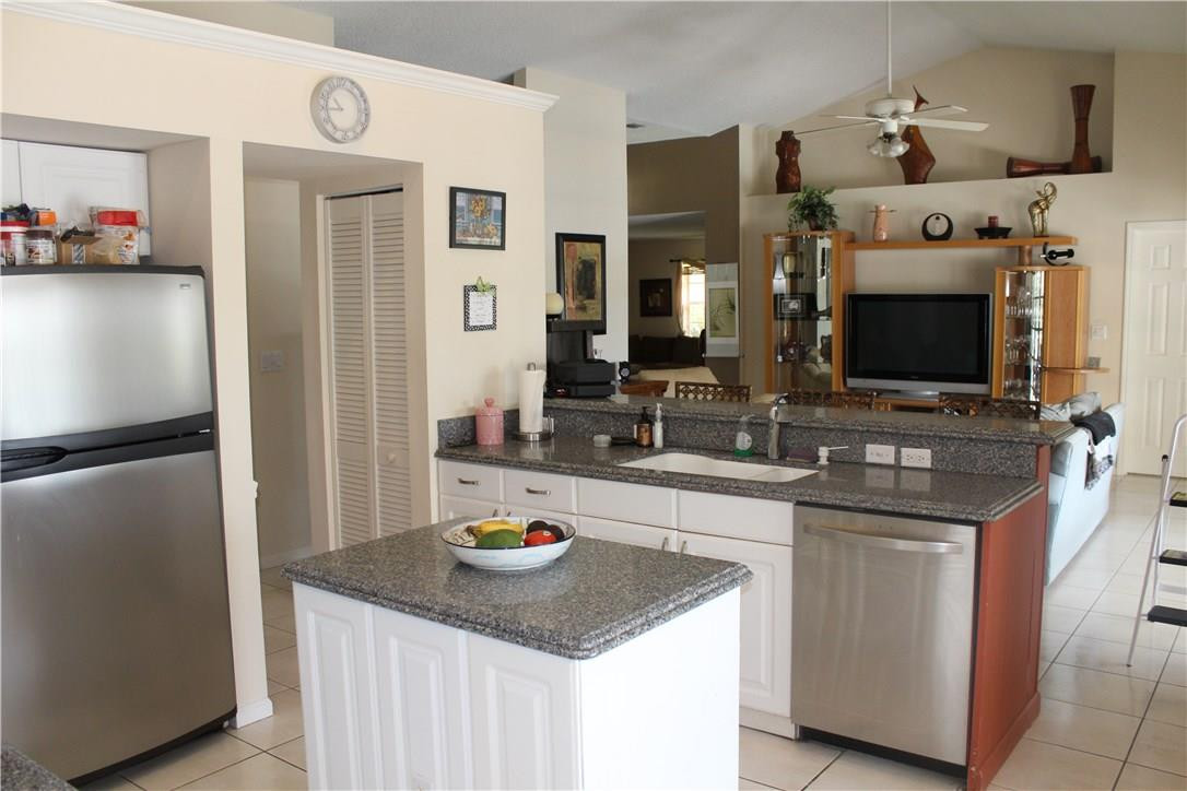 1335 Sabal Lakes Road Delray Beach, FL 33445 - Photo 3 of 16 Kitchen - Living room