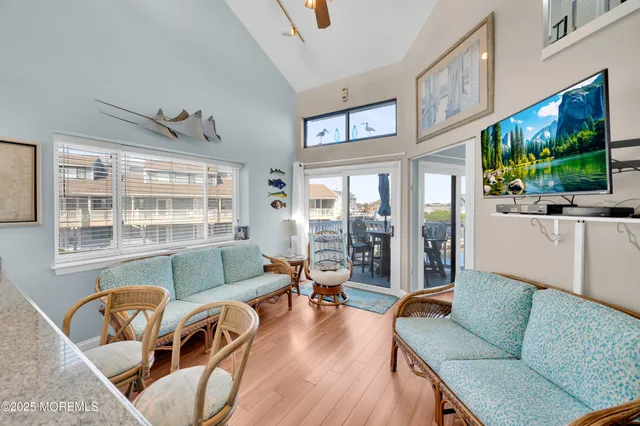 a living room with furniture and a table