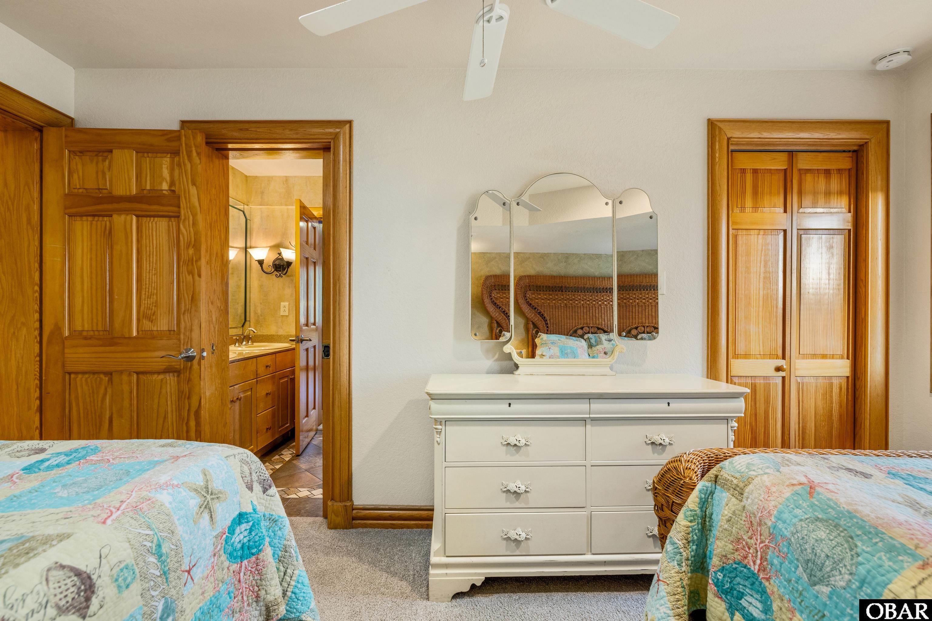 135 Salt House Road Corolla, NC 27927 - Photo 44 of 50 Lower level bedroom