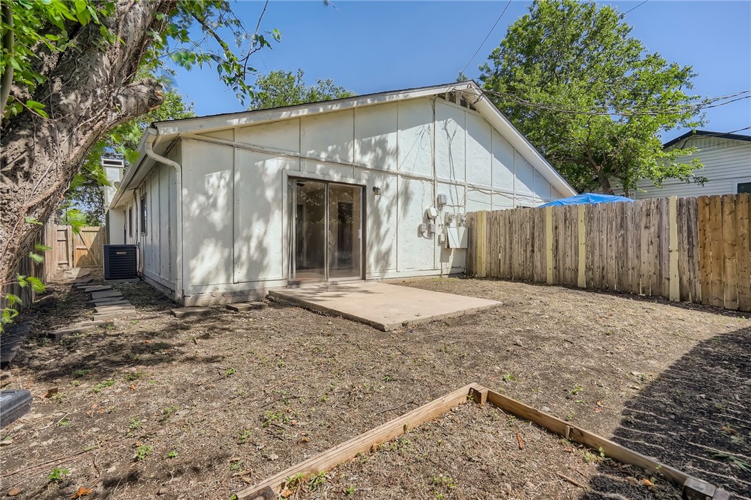 2712 Parker Lane, Unit A Austin, TX 78741 - Photo 11 of 13 a view of a small house with a small yard