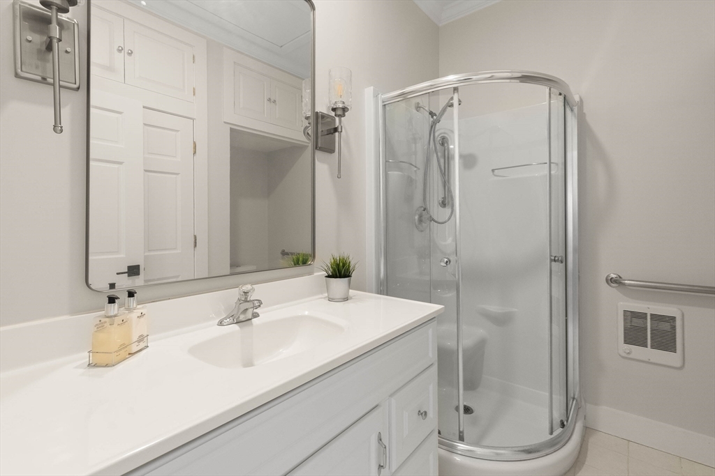 250 Cutler Road Hamilton, MA 01982 - Photo 16 of 34 a bathroom with a sink a toilet and shower