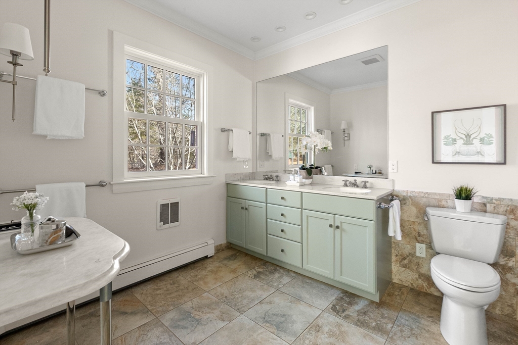 250 Cutler Road Hamilton, MA 01982 - Photo 20 of 34 a bathroom with a toilet sink and mirror