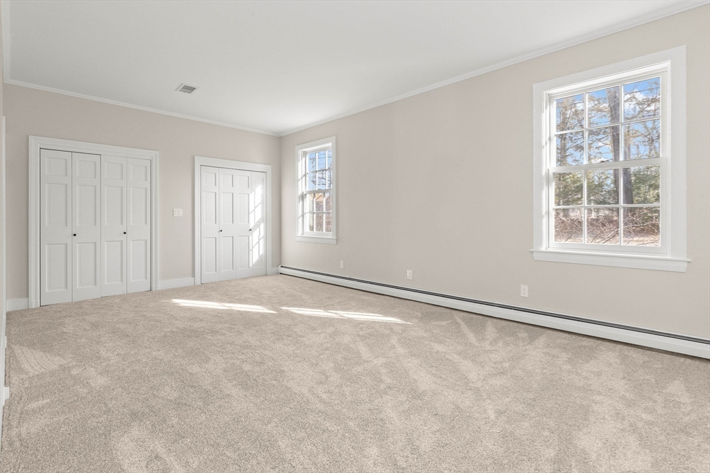 250 Cutler Road Hamilton, MA 01982 - Photo 23 of 34 a view of an empty room with a window