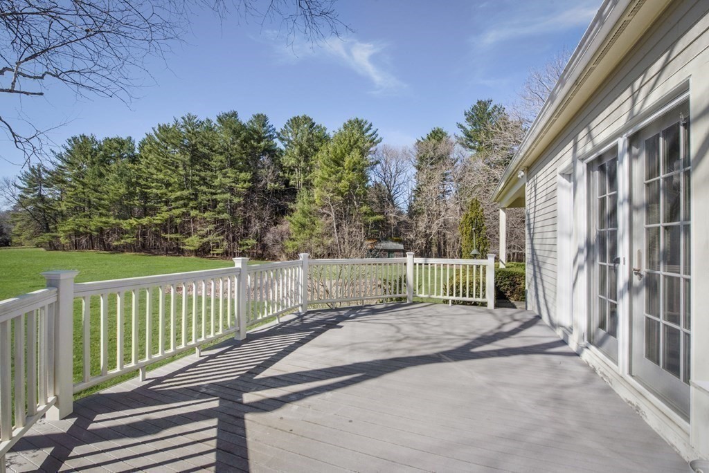 250 Cutler Road Hamilton, MA 01982 - Photo 28 of 34 a view of a backyard with a garden