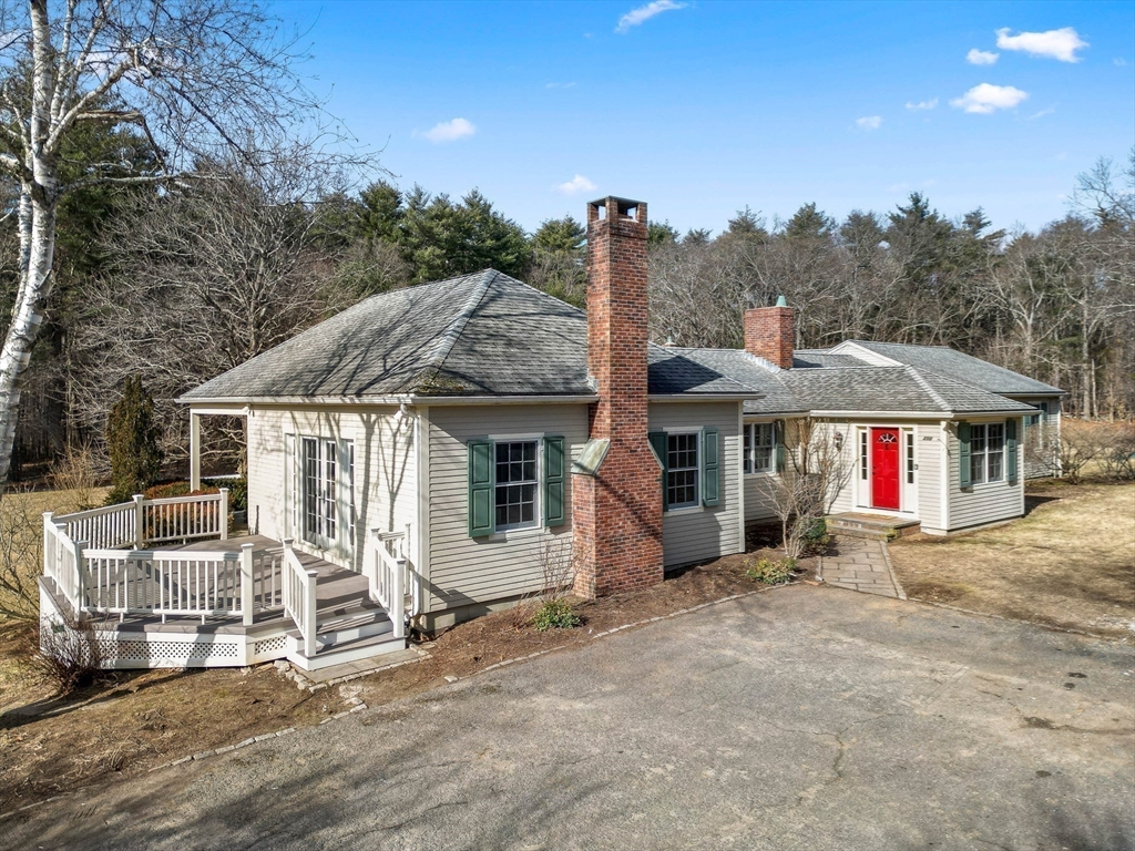 250 Cutler Road Hamilton, MA 01982 - Photo 3 of 34 a front view of a house with a porch