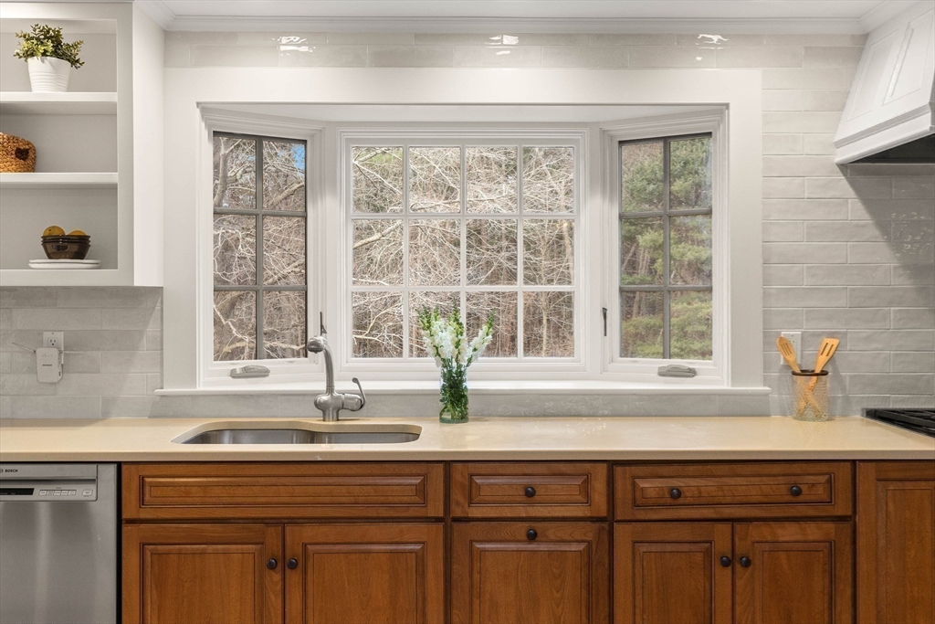 250 Cutler Road Hamilton, MA 01982 - Photo 6 of 34 a sink with a window and cabinets