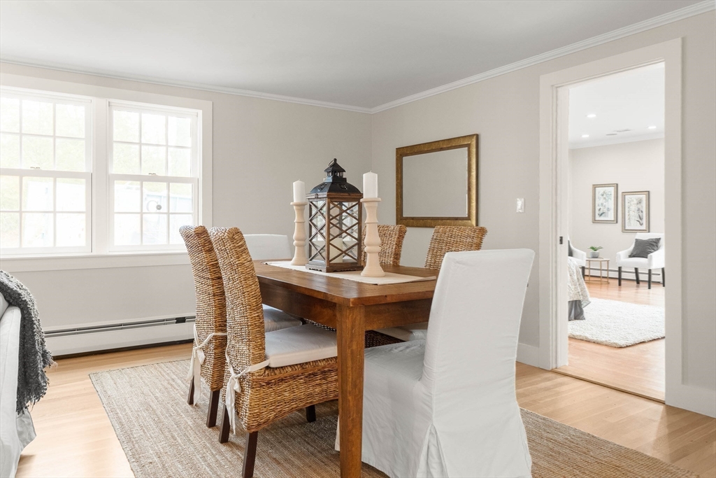 250 Cutler Road Hamilton, MA 01982 - Photo 9 of 34 a view of a dining room with furniture and wooden floor