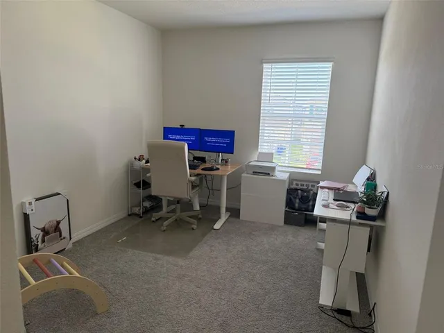 a room with furniture and window