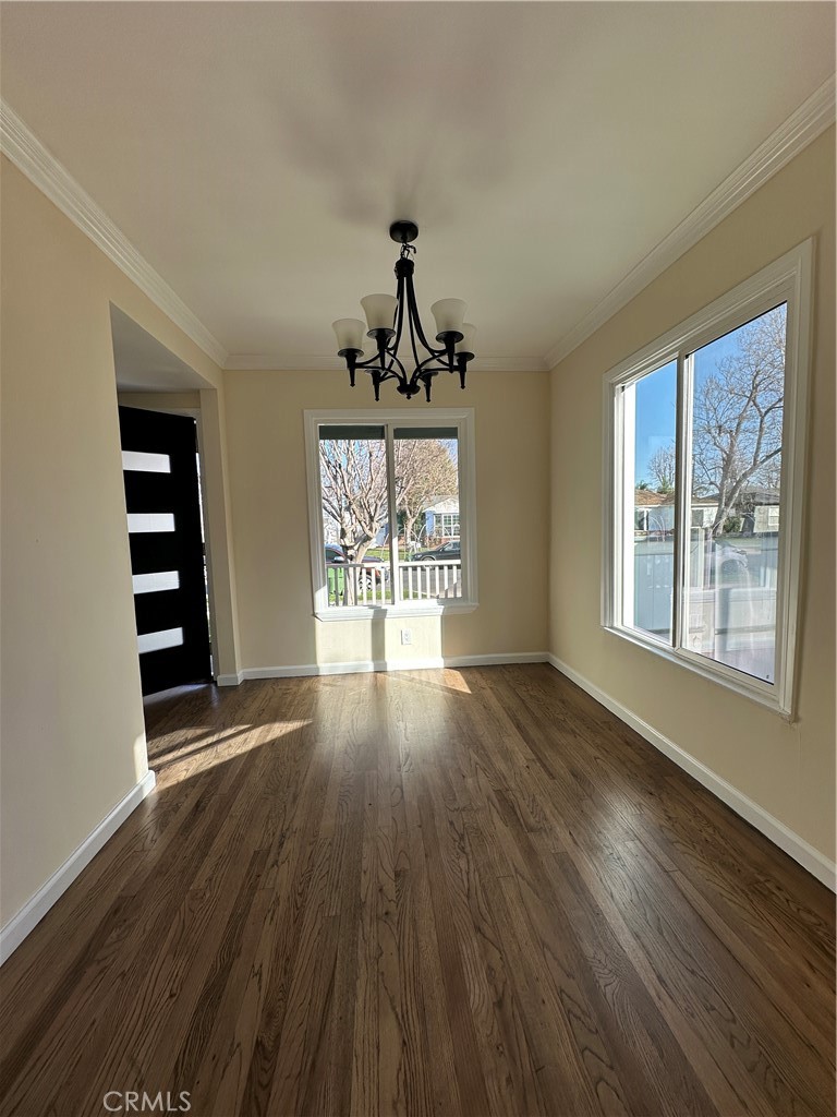 6447 Balcom Avenue Reseda, CA 91335 - Photo 15 of 49 wooden floor in an empty room with a window