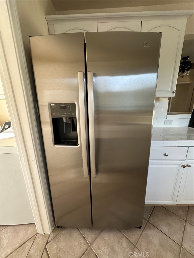 6447 Balcom Avenue Reseda, CA 91335 - Photo 21 of 49 a bathroom with a glass door shower and vanity