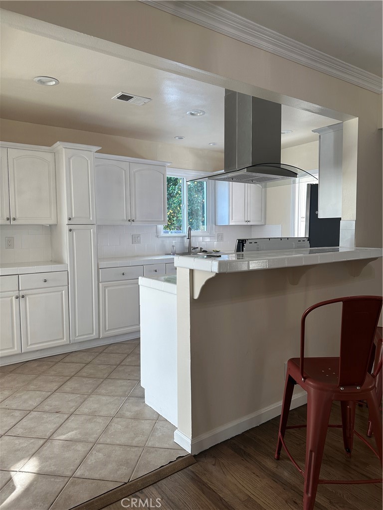 6447 Balcom Avenue Reseda, CA 91335 - Photo 26 of 49 a kitchen with a cabinets a sink and a counter top space