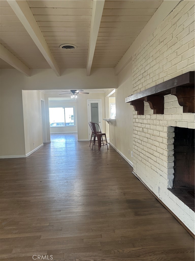 6447 Balcom Avenue Reseda, CA 91335 - Photo 34 of 49 a view of a livingroom with wooden floor and stairs