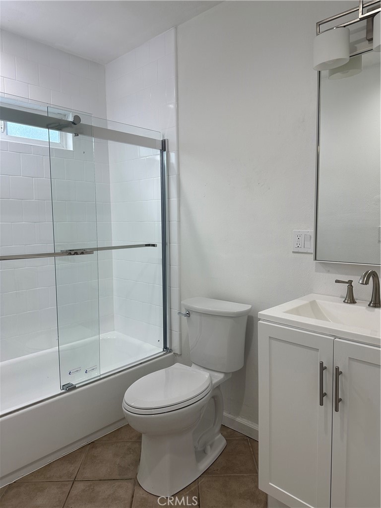 6447 Balcom Avenue Reseda, CA 91335 - Photo 36 of 49 a bathroom with a toilet a sink and shower