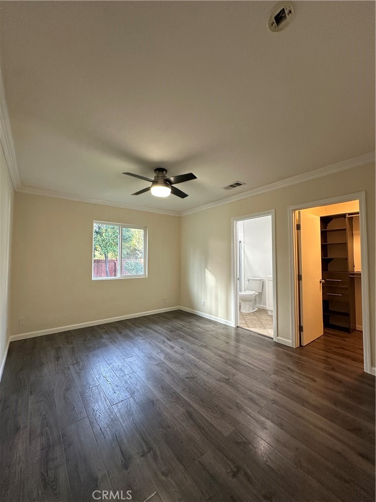6447 Balcom Avenue Reseda, CA 91335 - Photo 39 of 49 an empty room with wooden floor and windows
