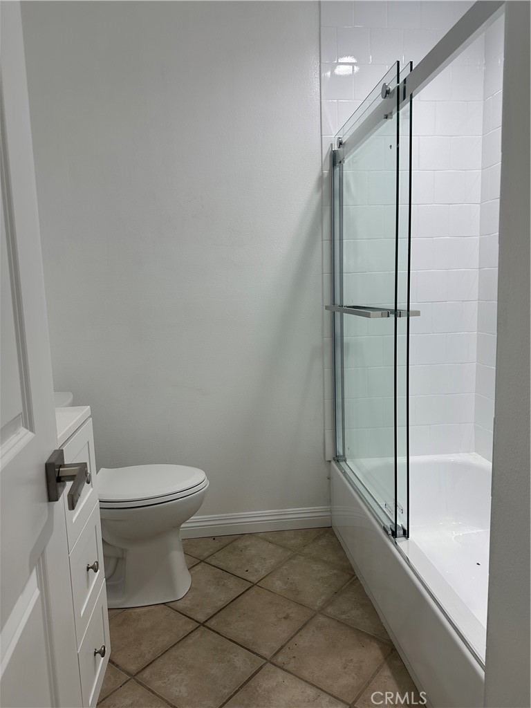 6447 Balcom Avenue Reseda, CA 91335 - Photo 42 of 49 a bathroom with a shower and a toilet