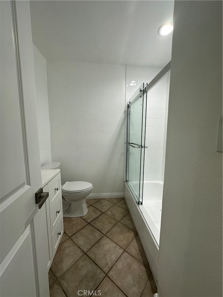 6447 Balcom Avenue Reseda, CA 91335 - Photo 44 of 49 a bathroom with a granite countertop sink toilet and shower
