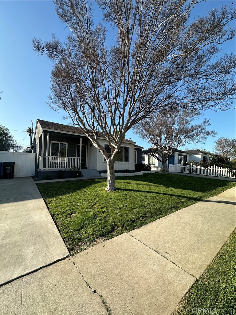 6447 Balcom Avenue Reseda, CA 91335 - Photo 5 of 49 front view of a house with a yard