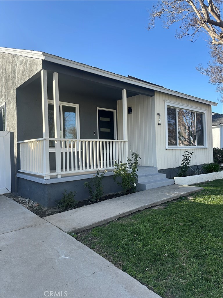 6447 Balcom Avenue Reseda, CA 91335 - Photo 6 of 49 a front view of a house with garden