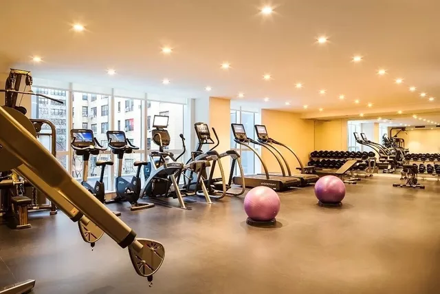 a view of a room with gym equipment